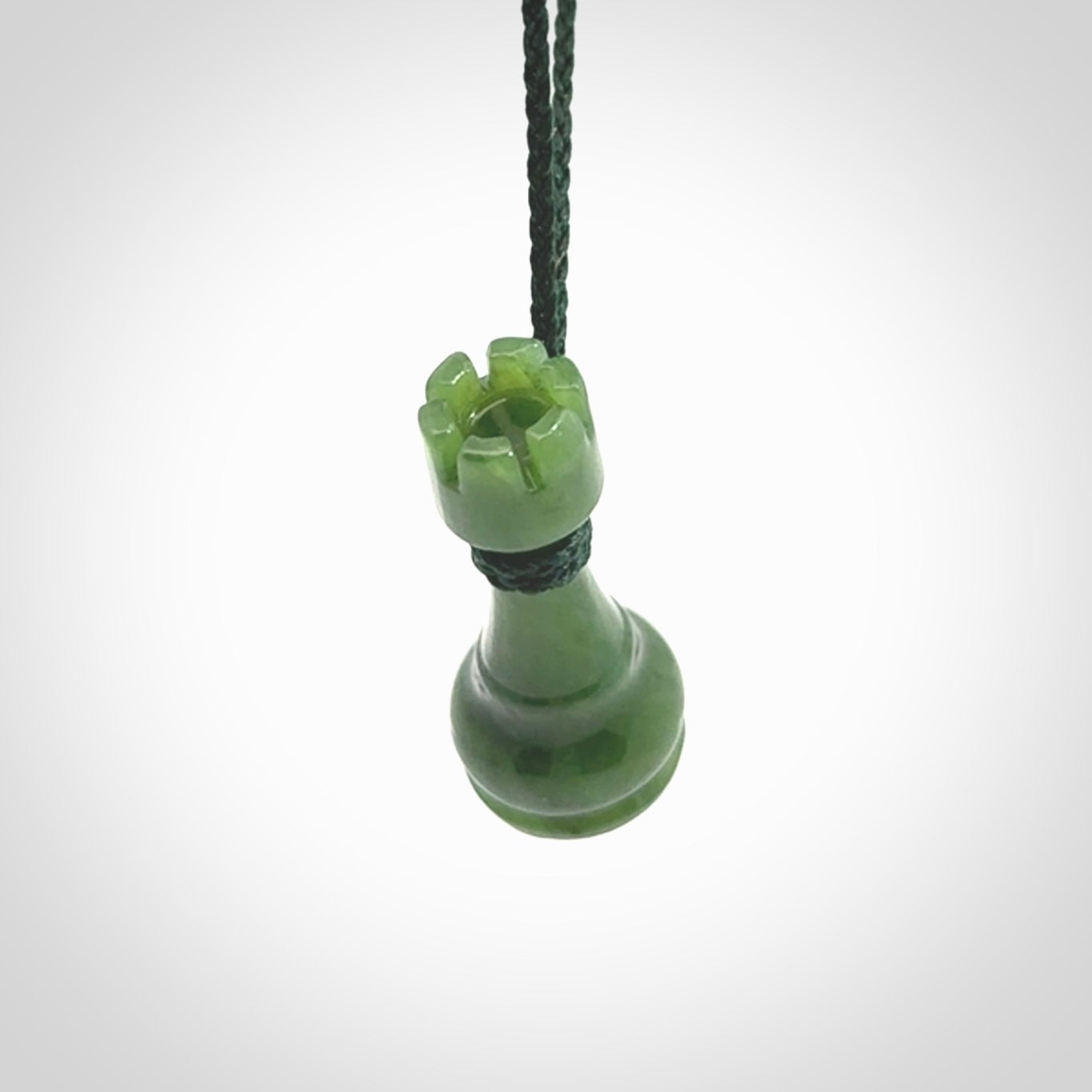 Hand carved jade chess pendants. Hand made chess piece necklaces, carved from British Columbian Jade.