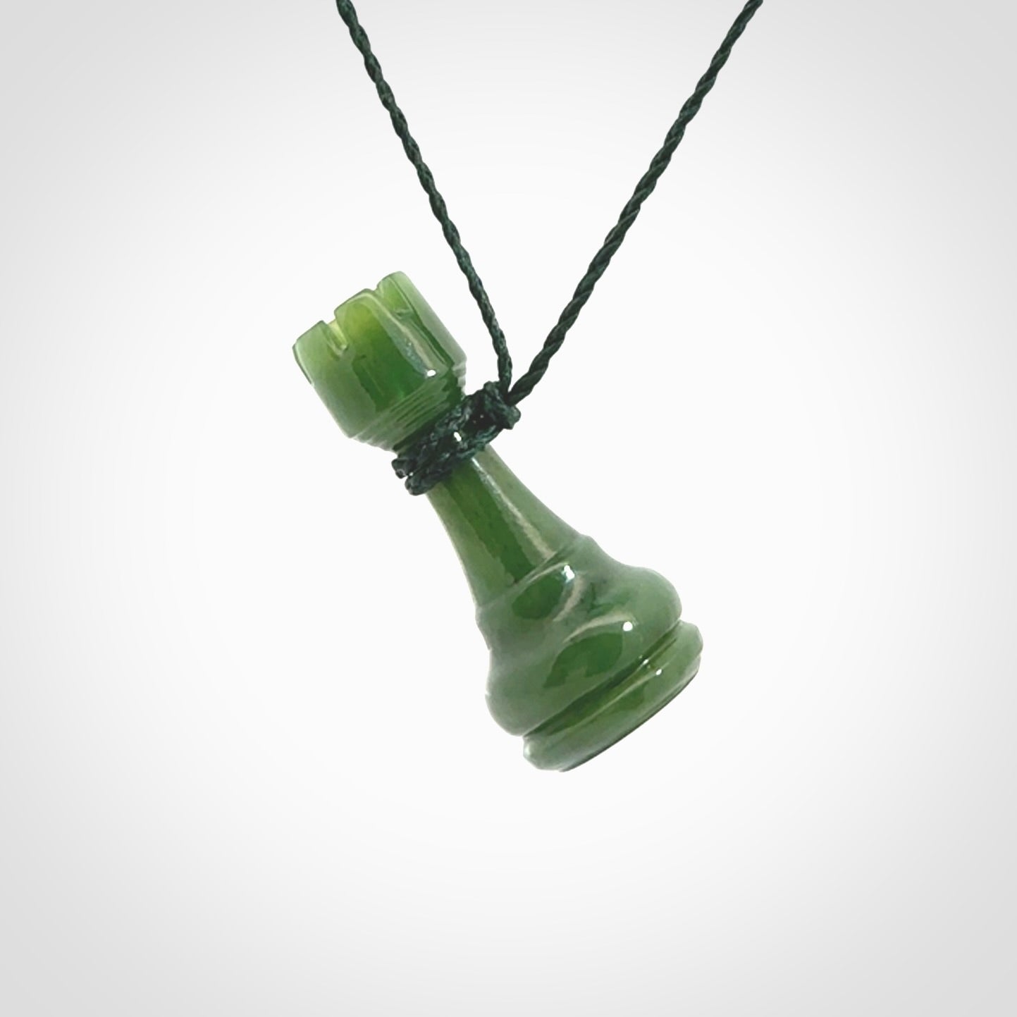 Hand carved jade chess pendants. Hand made chess piece necklaces, carved from British Columbian Jade.