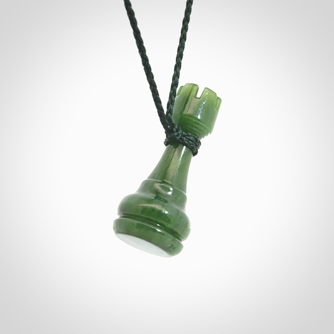 Hand carved jade chess pendants. Hand made chess piece necklaces, carved from British Columbian Jade.