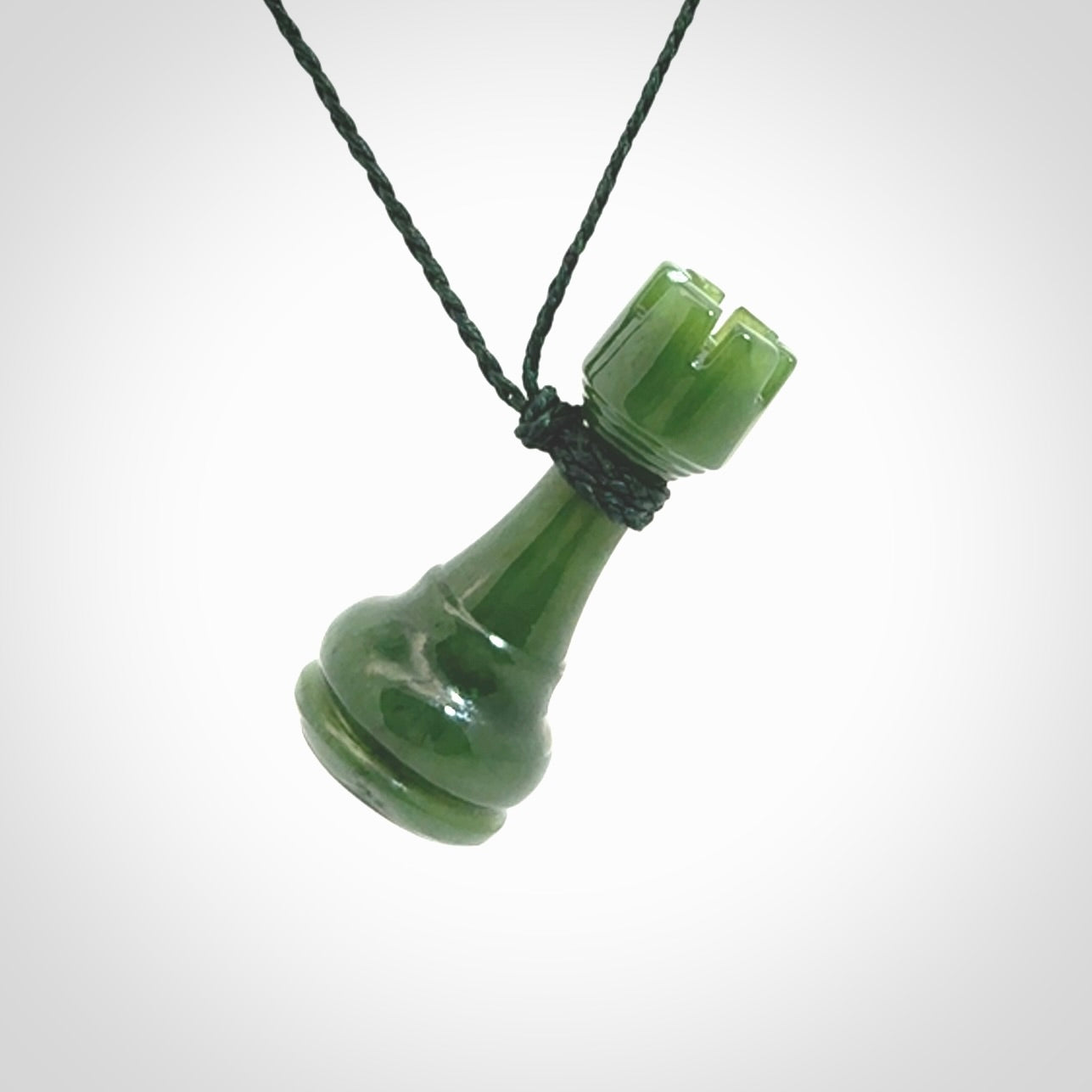 Hand carved jade chess pendants. Hand made chess piece necklaces, carved from British Columbian Jade.