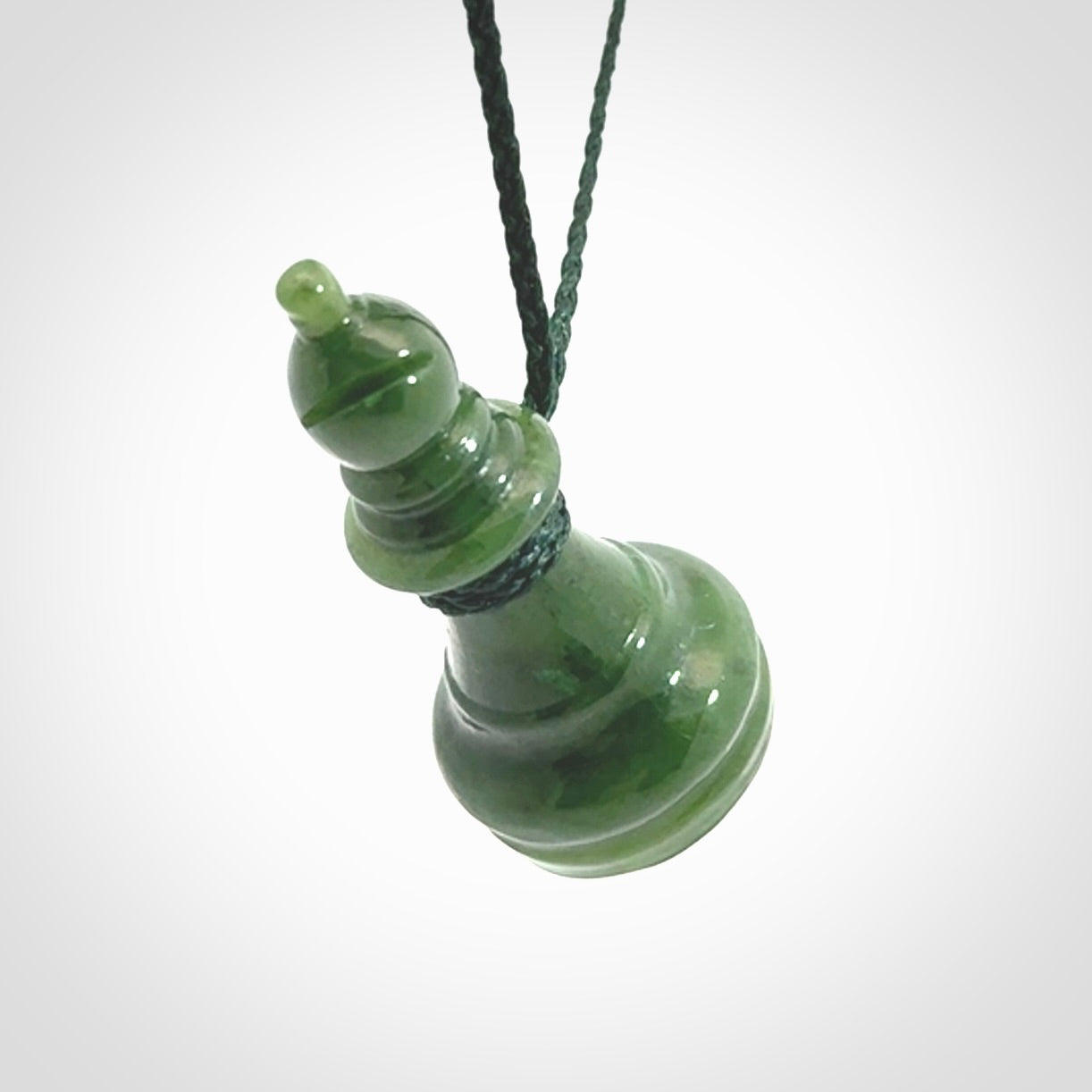 Hand carved jade chess pendants. Hand made chess piece necklaces, carved from British Columbian Jade.