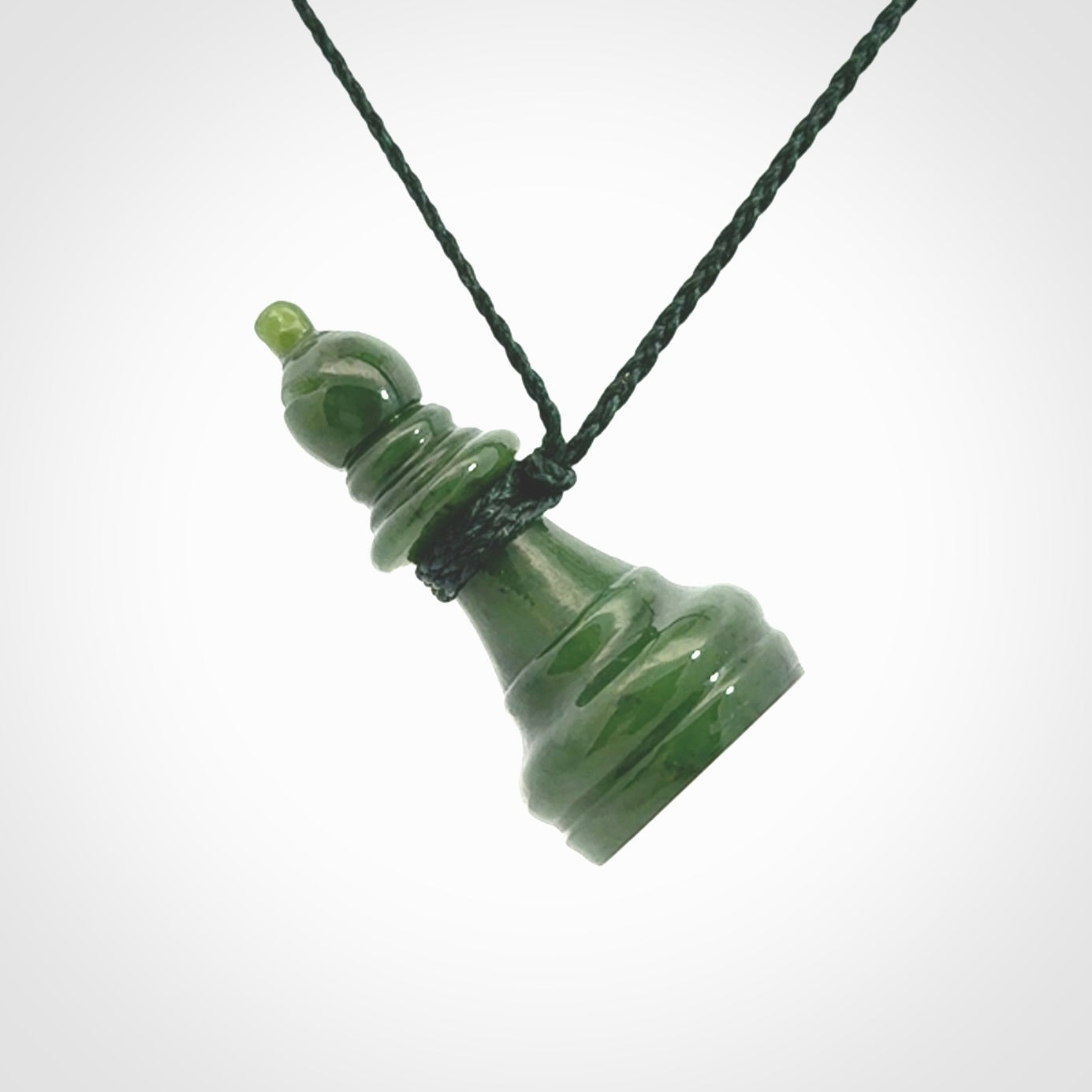 Hand carved jade chess pendants. Hand made chess piece necklaces, carved from British Columbian Jade.