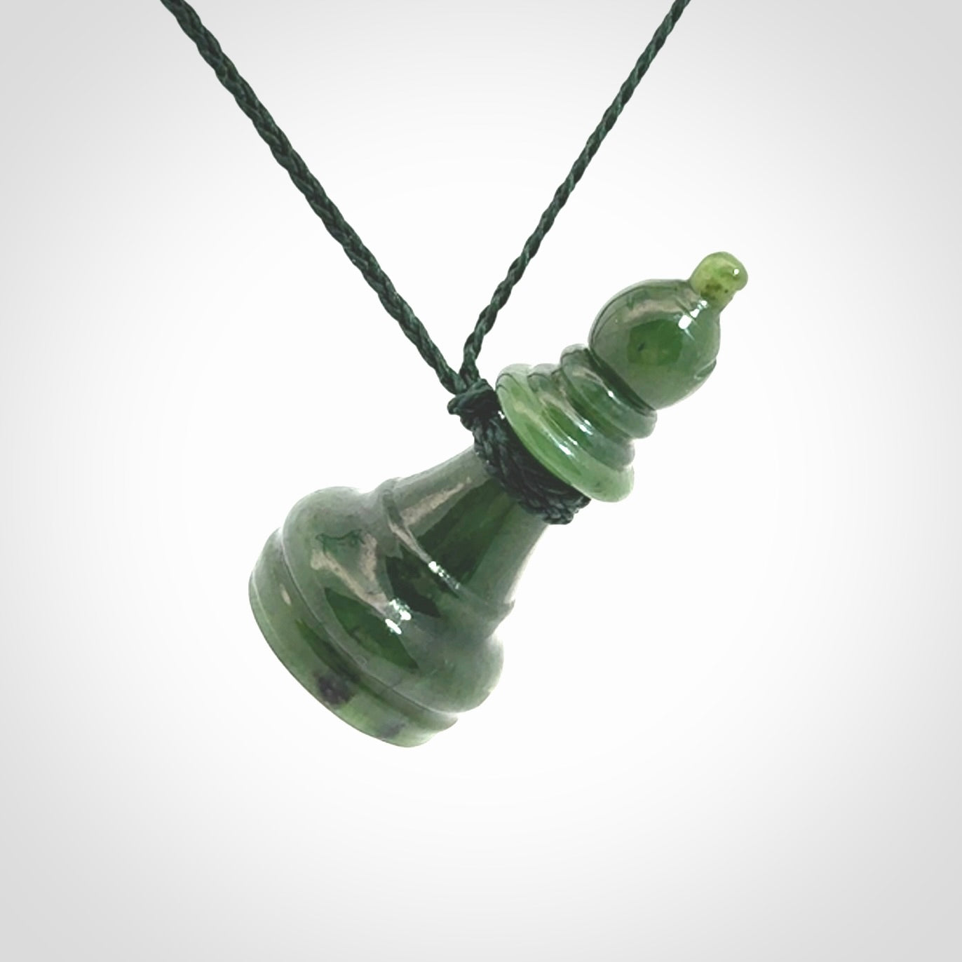 Hand carved jade chess pendants. Hand made chess piece necklaces, carved from British Columbian Jade.