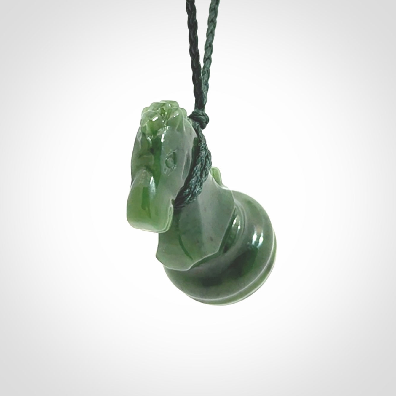 Hand carved jade chess pendants. Hand made chess piece necklaces, carved from British Columbian Jade.