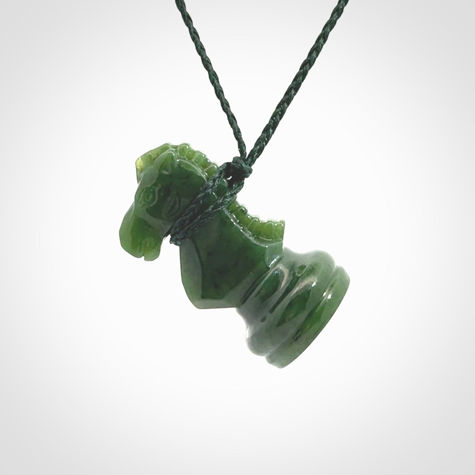 Hand carved jade chess pendants. Hand made chess piece necklaces, carved from British Columbian Jade.