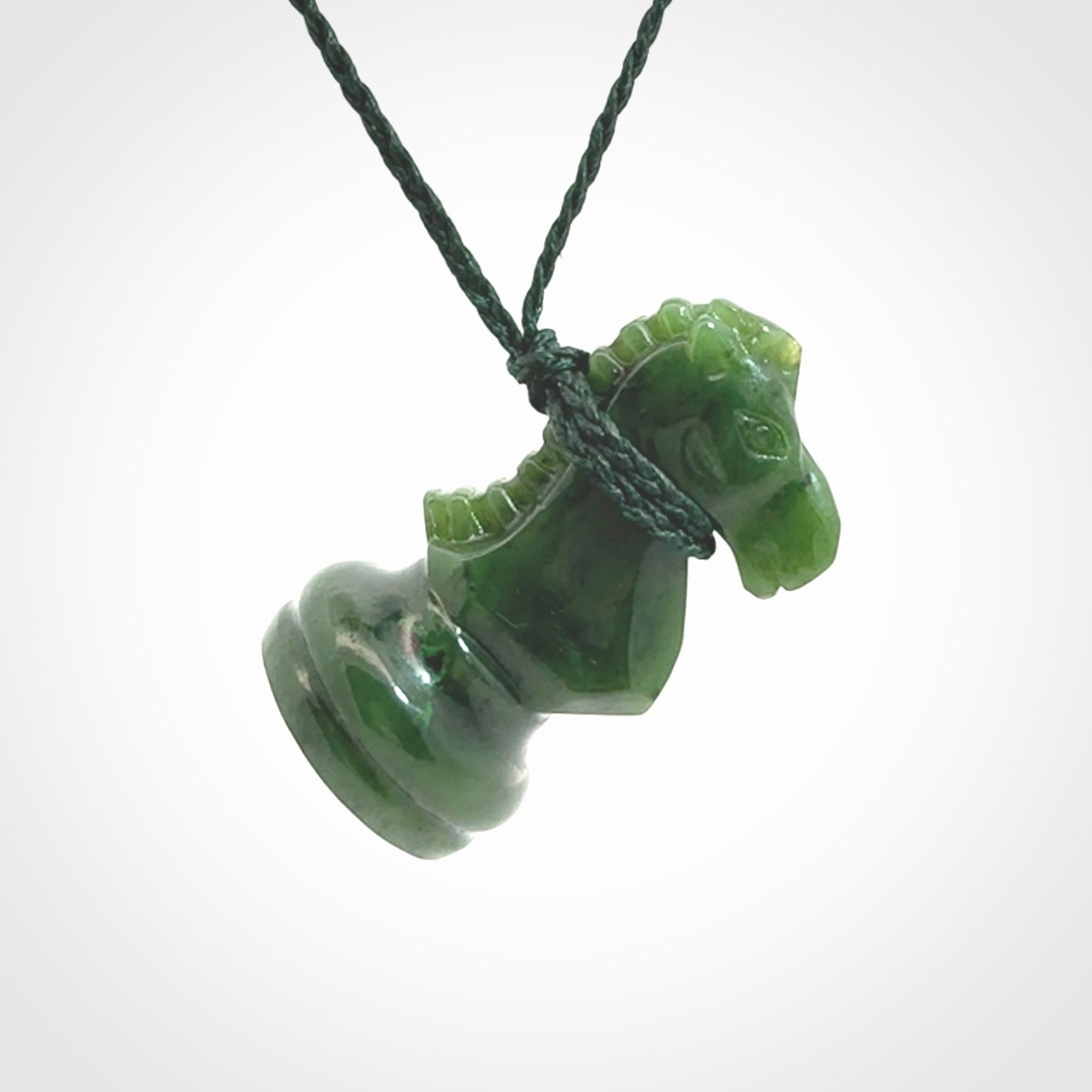 Hand carved jade chess pendants. Hand made chess piece necklaces, carved from British Columbian Jade.