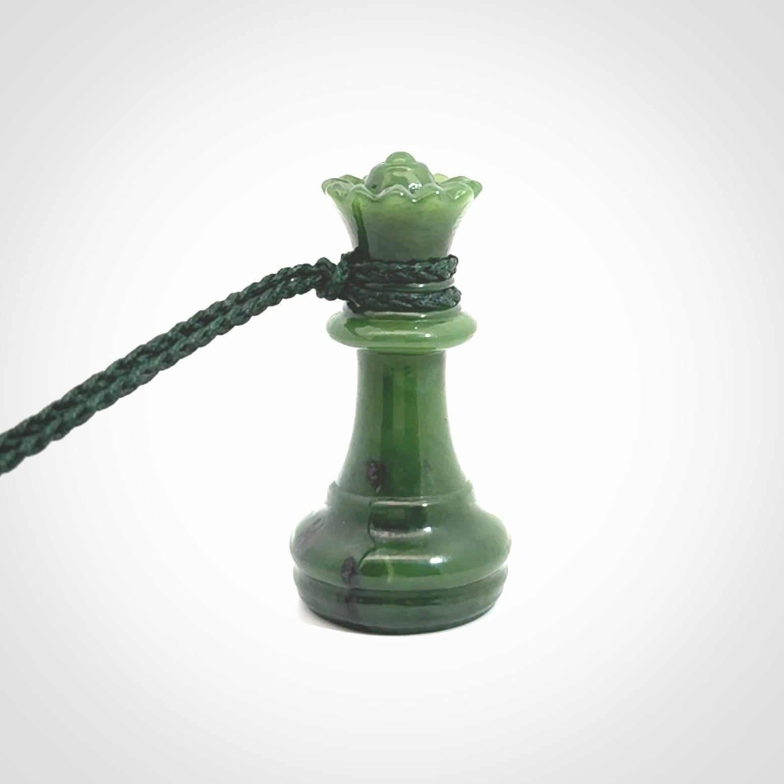 Hand carved jade chess pendants. Hand made chess piece necklaces, carved from British Columbian Jade.