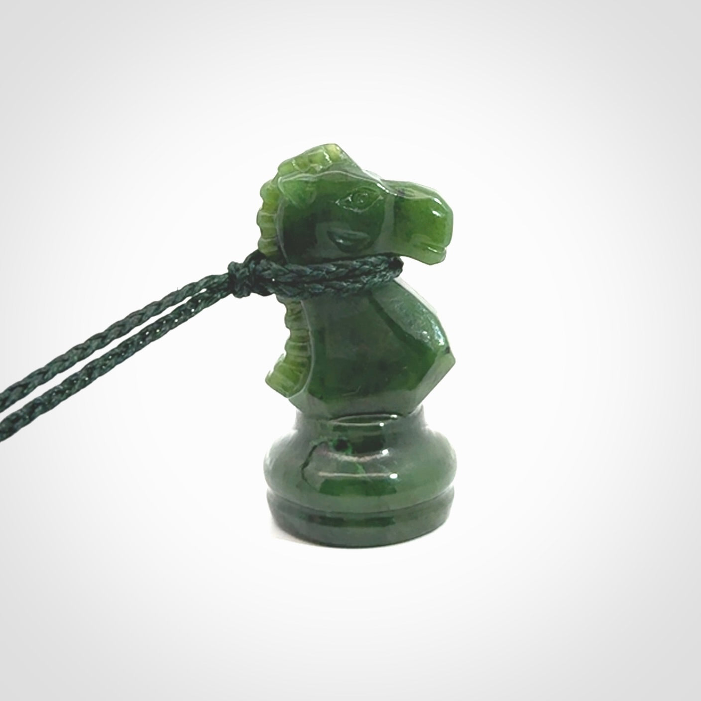 Hand carved jade chess pendants. Hand made chess piece necklaces, carved from British Columbian Jade.