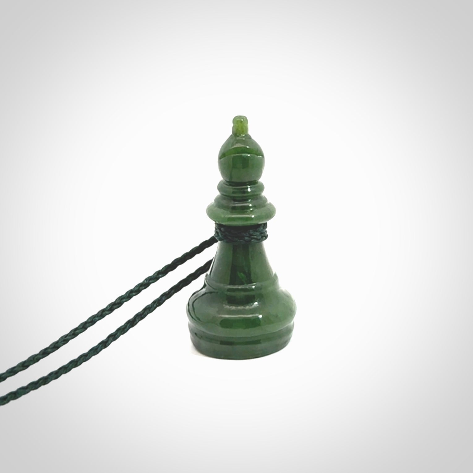 Hand carved jade chess pendants. Hand made chess piece necklaces, carved from British Columbian Jade.