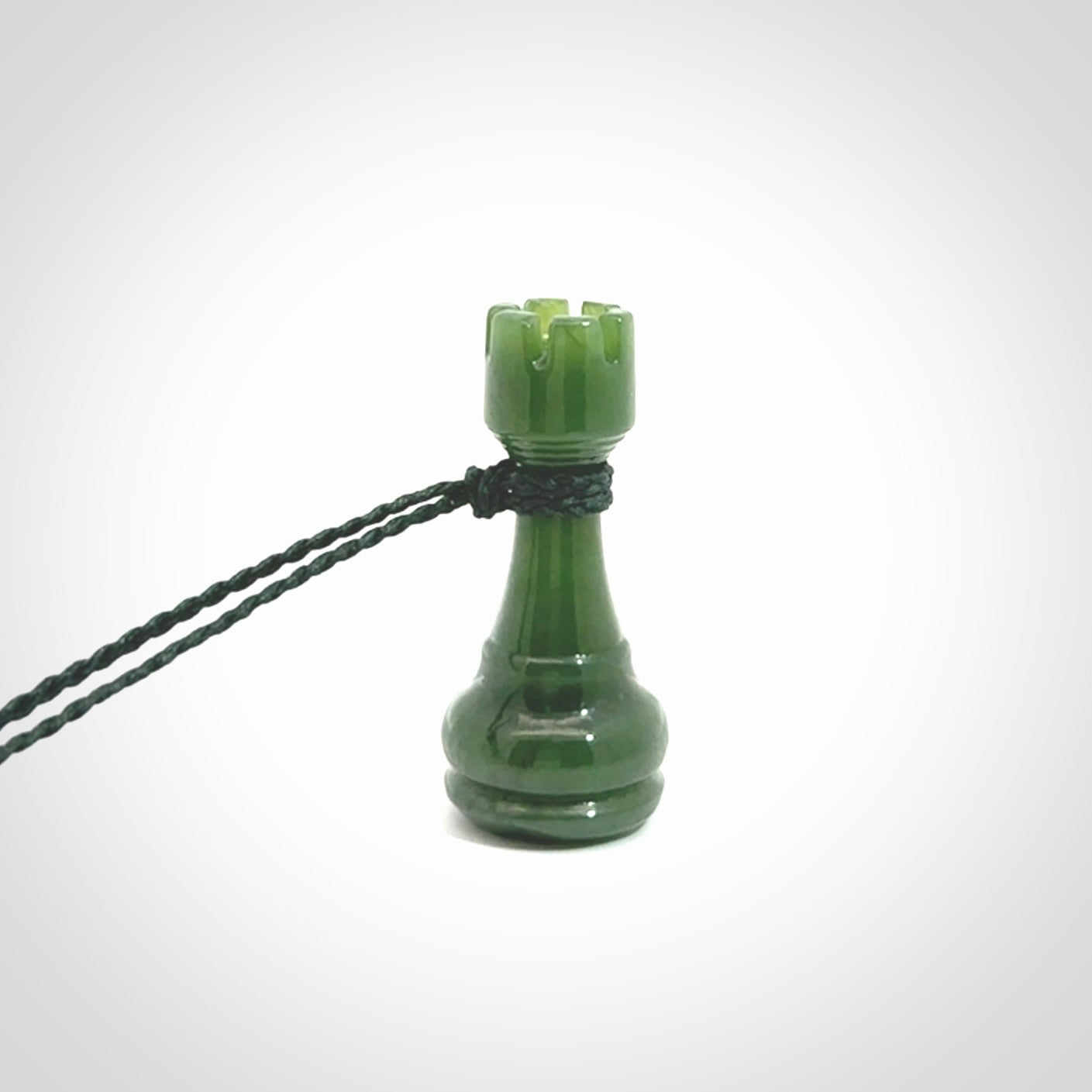 Hand carved jade chess pendants. Hand made chess piece necklaces, carved from British Columbian Jade.