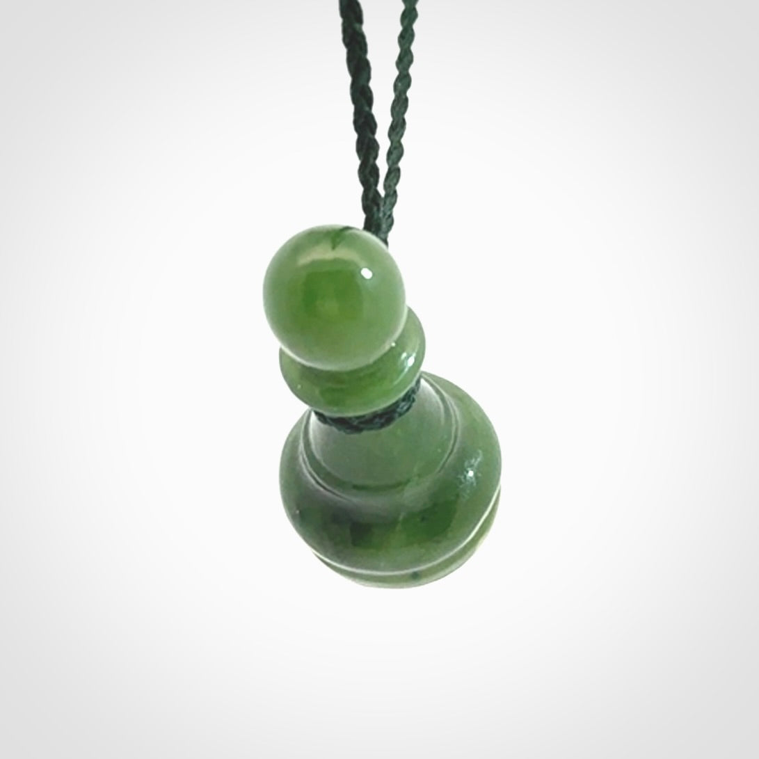 Hand carved jade chess pendants. Hand made chess piece necklaces, carved from British Columbian Jade.