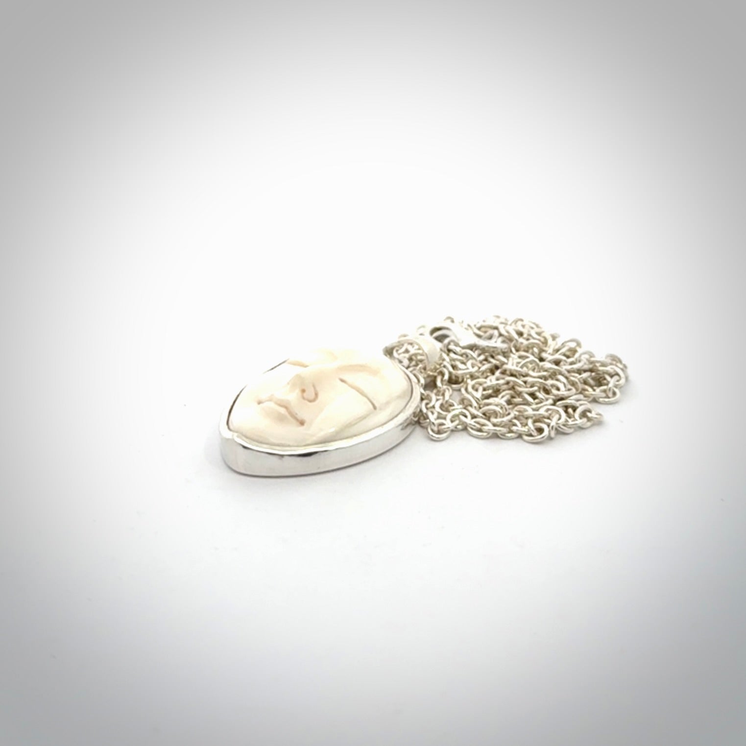 Hand made woolly mammoth tusk moon face necklace and matching earrings