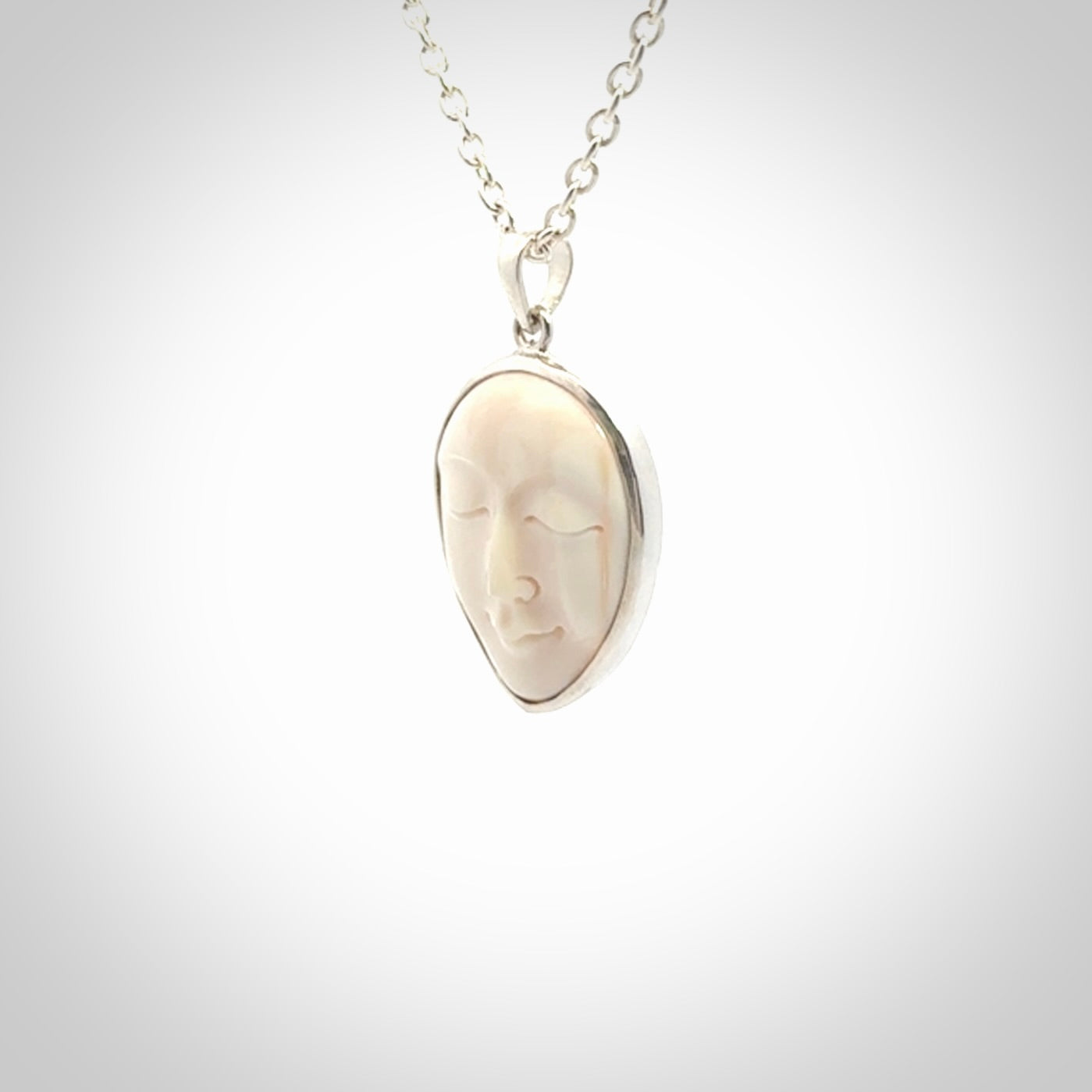 Hand made woolly mammoth tusk moon face necklace and matching earrings