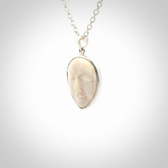 Hand made woolly mammoth tusk moon face necklace and matching earrings