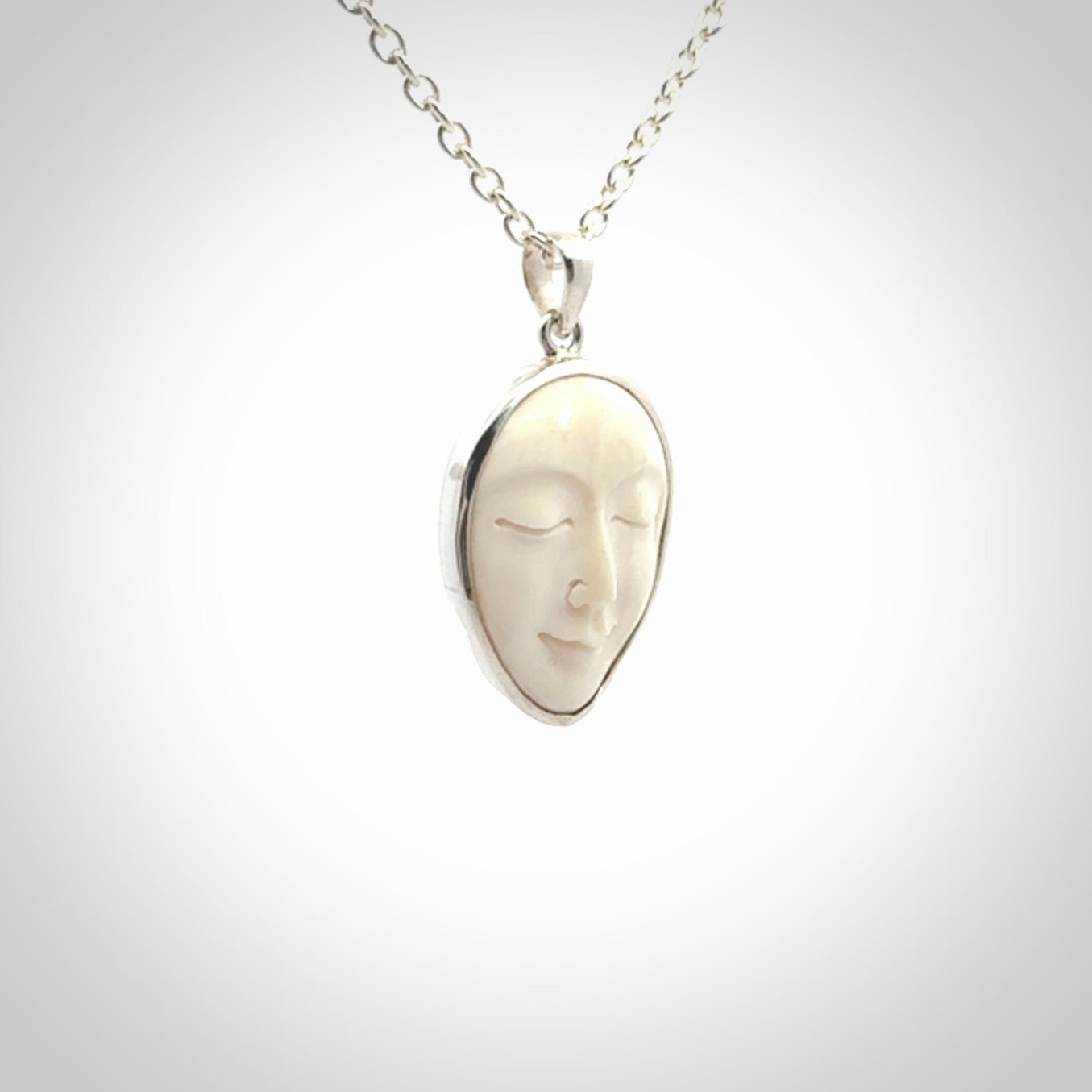 Hand made woolly mammoth tusk moon face necklace and matching earrings