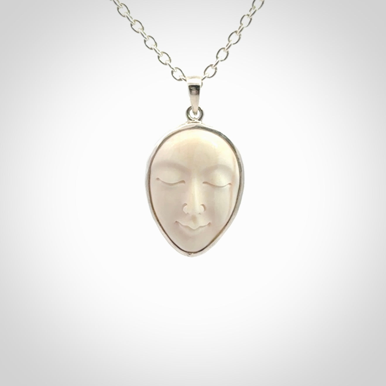 Hand made woolly mammoth tusk moon face necklace and matching earrings