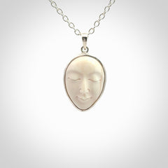 Hand made woolly mammoth tusk moon face necklace and matching earrings