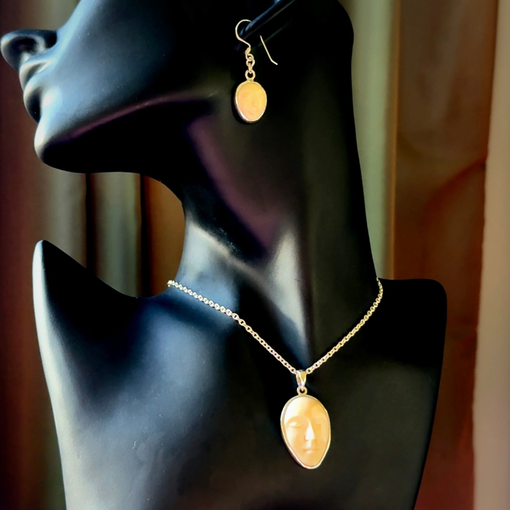 Hand made woolly mammoth tusk moon face necklace and matching earrings