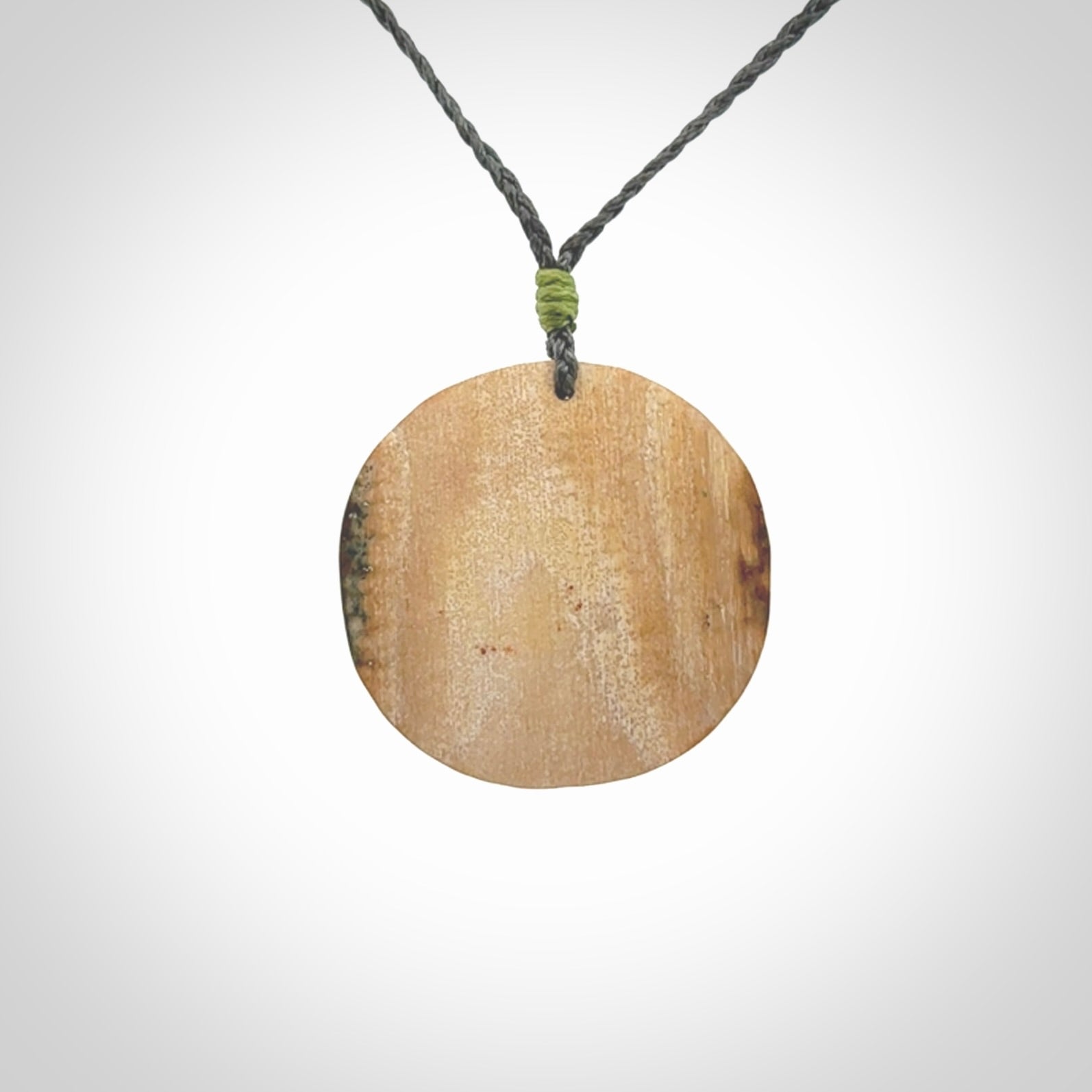 Merino and ewe pendant carved in mammoth tusk