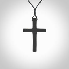 Hand carved black jade crucifix pendant. The cross has been carved from Australian black jade and the Christ from Woolly Mammoth Tusk. This is a beautiful crucifix that has been handmade by NZ Pacific. For sale online and shipping is free.