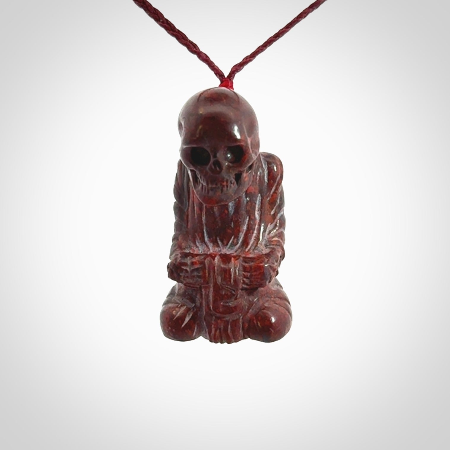 A Very Cool Skeleton Monk pendant, Carved in Jasper