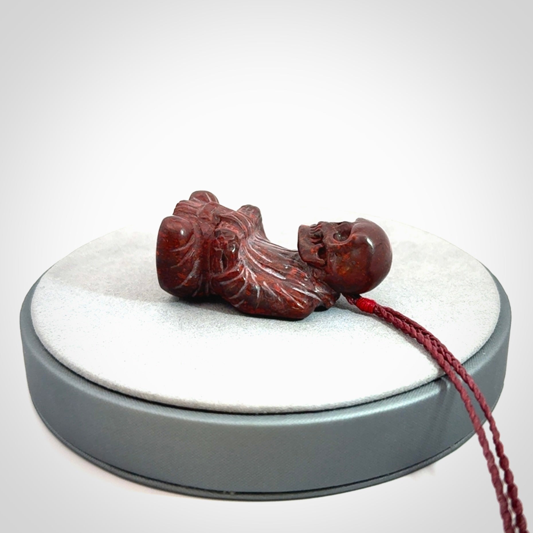 A Very Cool Skeleton Monk pendant, Carved in Jasper