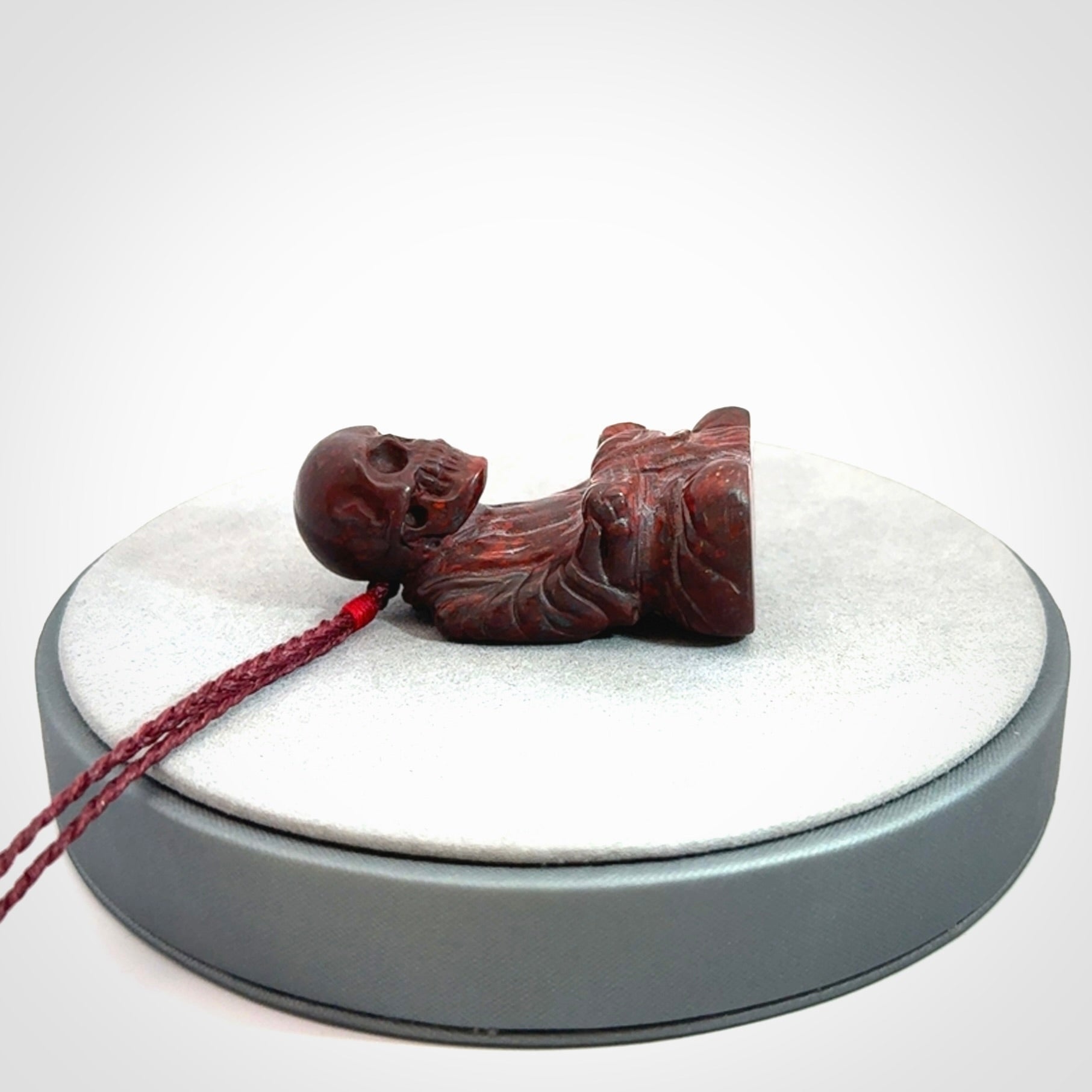 A Very Cool Skeleton Monk pendant, Carved in Jasper