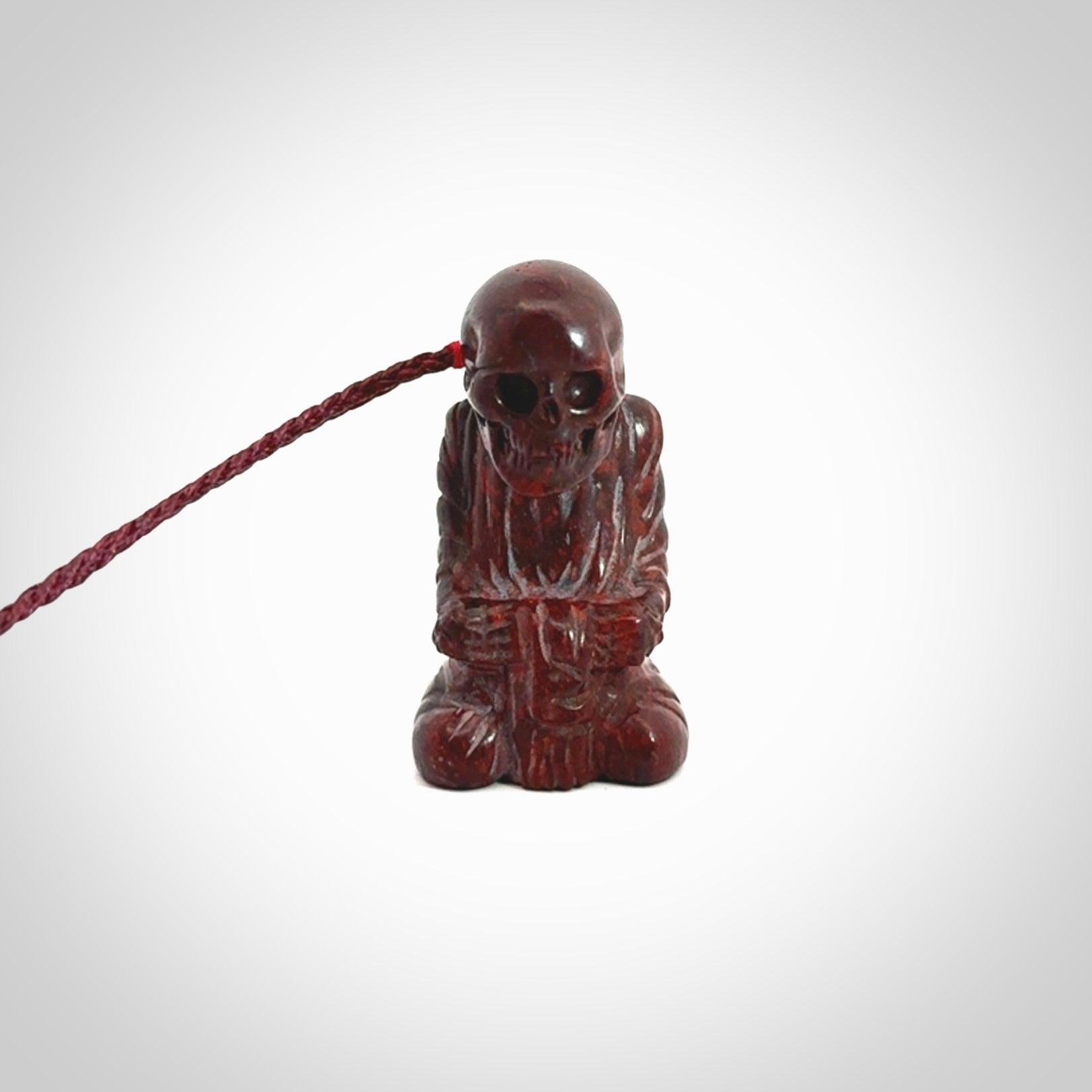 A Very Cool Skeleton Monk pendant, Carved in Jasper