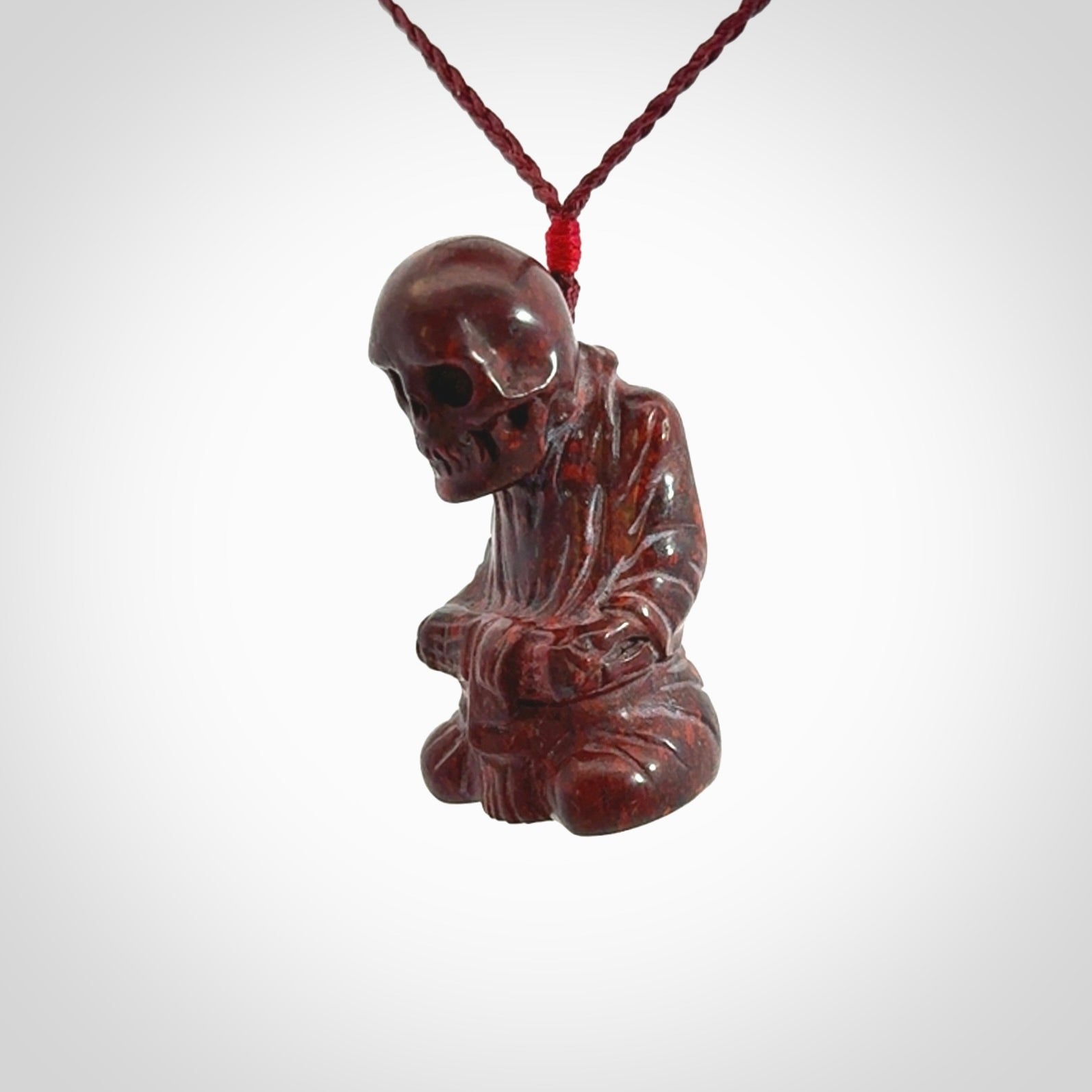 A Very Cool Skeleton Monk pendant, Carved in Jasper