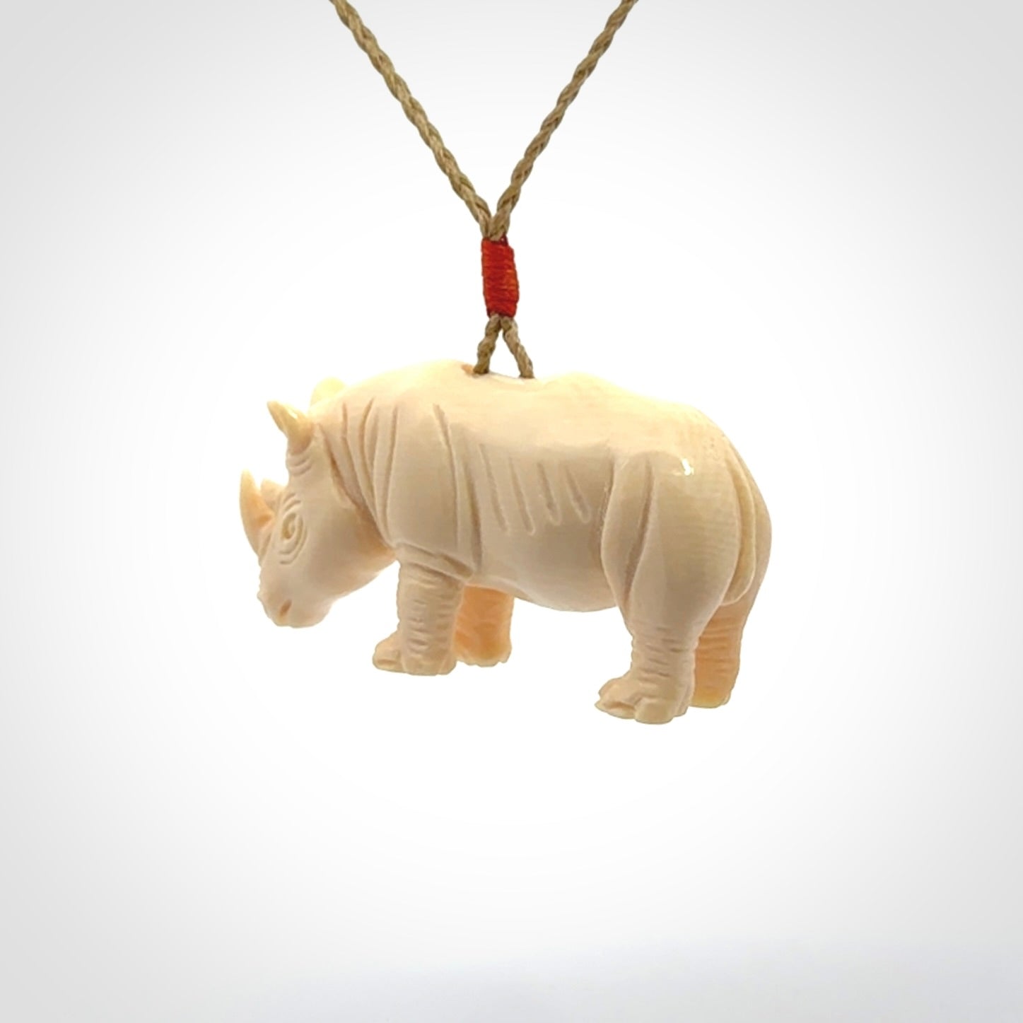 Magnificent Ancient Woolly Mammoth Tusk Rhino Pendant