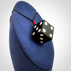 Hand carved black jade and bone dice pendant