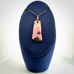 A gorgeous little pendant, carved in Aroha Stone