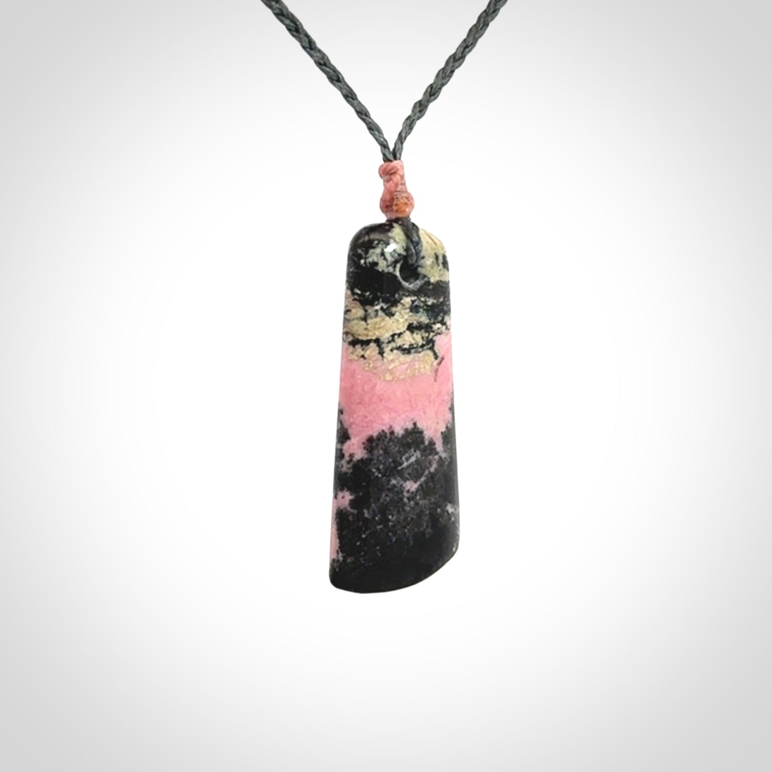 A gorgeous little pendant, carved in Aroha Stone