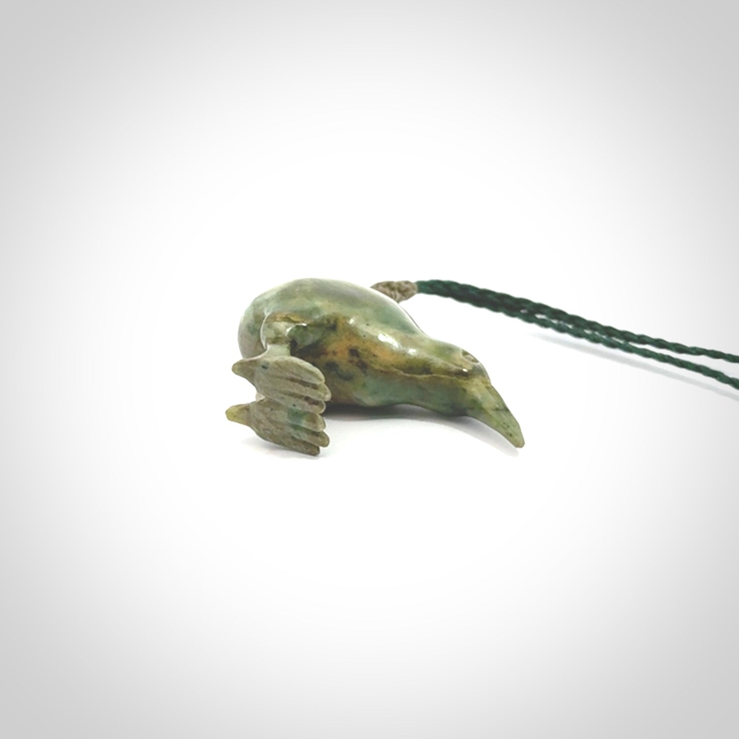 A beautiful little, handcarved kiwi pendant. This piece is carved from jade from Aceh and is a remarkably unique piece of handmade jewellery. made by NZ Pacific and for sale on our website. Shipping is free worldwide.