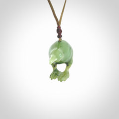 A beautiful little, handcarved kiwi pendant. This piece is carved from jade from Aceh and is a remarkably unique piece of handmade jewellery. made by NZ Pacific and for sale on our website. Shipping is free worldwide.