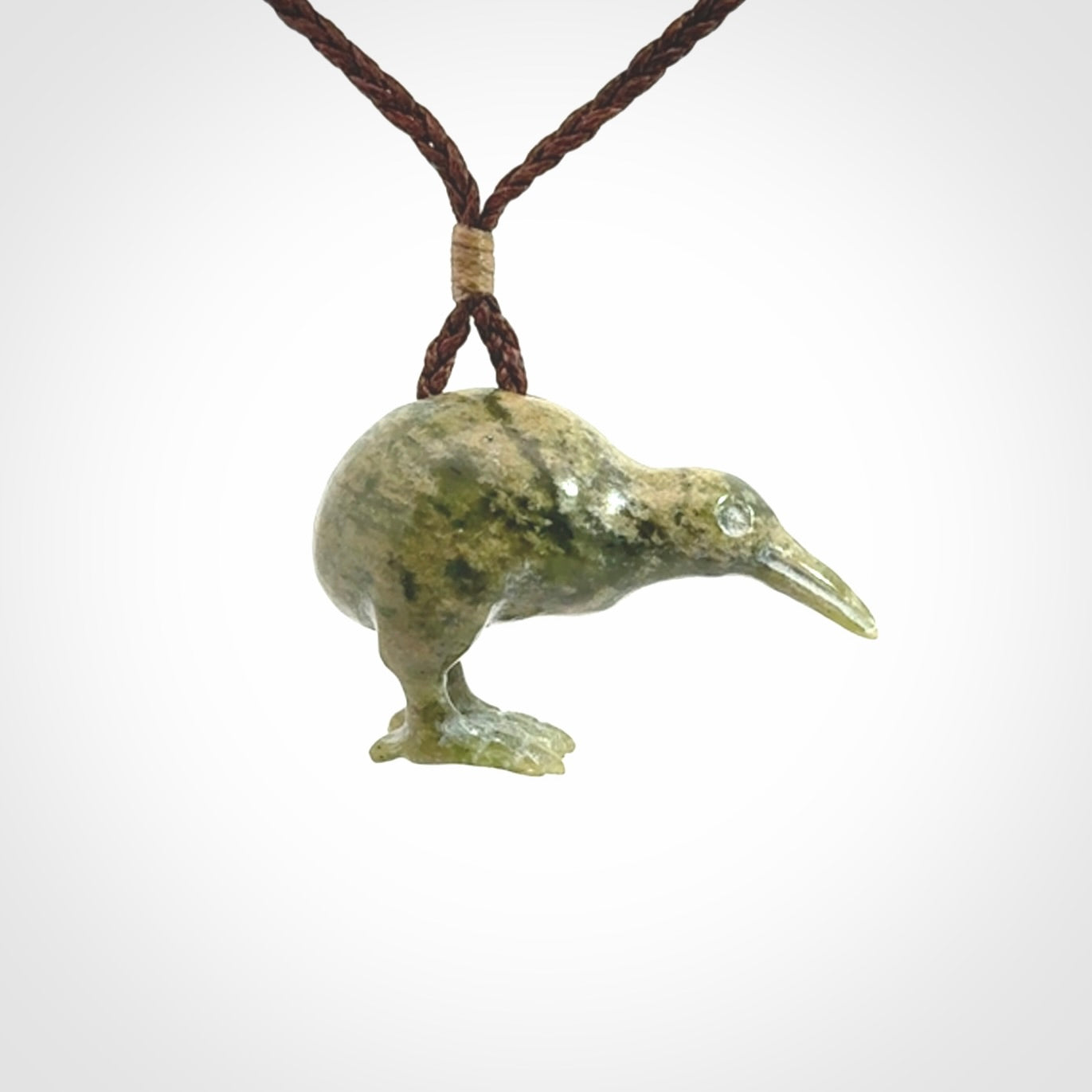A beautiful little, handcarved kiwi pendant. This piece is carved from jade from Aceh and is a remarkably unique piece of handmade jewellery. made by NZ Pacific and for sale on our website. Shipping is free worldwide.