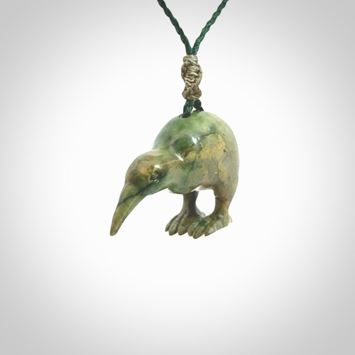 A beautiful little, handcarved kiwi pendant. This piece is carved from jade from Aceh and is a remarkably unique piece of handmade jewellery. made by NZ Pacific and for sale on our website. Shipping is free worldwide.