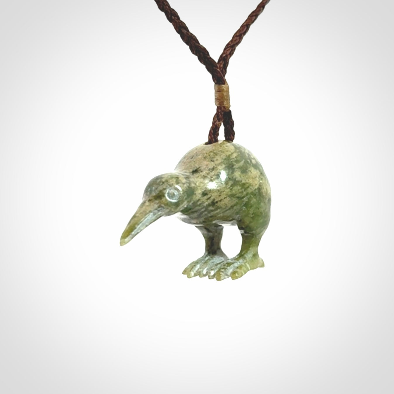 A beautiful little, handcarved kiwi pendant. This piece is carved from jade from Aceh and is a remarkably unique piece of handmade jewellery. made by NZ Pacific and for sale on our website. Shipping is free worldwide.