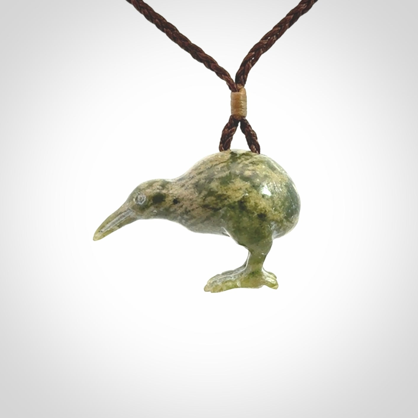A beautiful little, handcarved kiwi pendant. This piece is carved from jade from Aceh and is a remarkably unique piece of handmade jewellery. made by NZ Pacific and for sale on our website. Shipping is free worldwide.