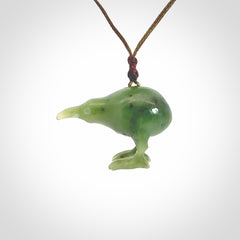 A beautiful little, handcarved kiwi pendant. This piece is carved from jade from Aceh and is a remarkably unique piece of handmade jewellery. made by NZ Pacific and for sale on our website. Shipping is free worldwide.