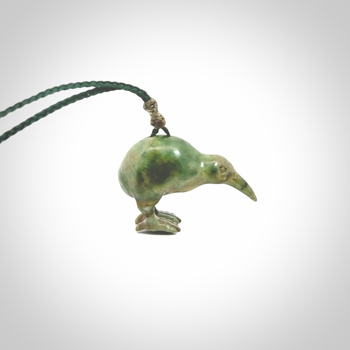 A beautiful little, handcarved kiwi pendant. This piece is carved from jade from Aceh and is a remarkably unique piece of handmade jewellery. made by NZ Pacific and for sale on our website. Shipping is free worldwide.