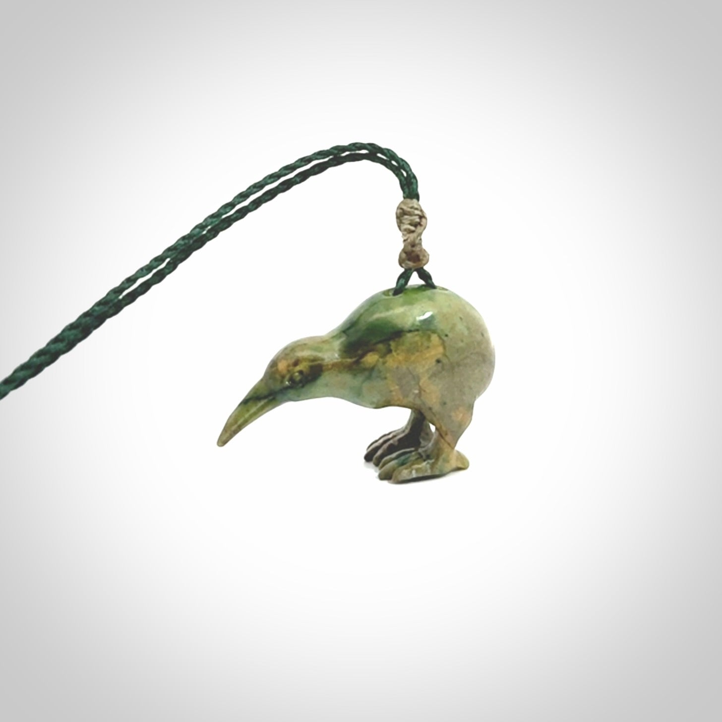 A beautiful little, handcarved kiwi pendant. This piece is carved from jade from Aceh and is a remarkably unique piece of handmade jewellery. made by NZ Pacific and for sale on our website. Shipping is free worldwide.