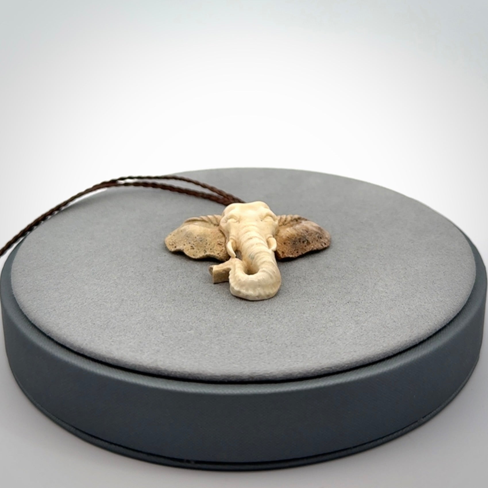 These are hand made elephant pendants, carved in a Deer Antler. The cord is length adjustable. Provided in a woven kete pouch and delivered with express courier.