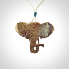 These are hand made elephant pendants, carved in a Deer Antler. The cord is length adjustable. Provided in a woven kete pouch and delivered with express courier.