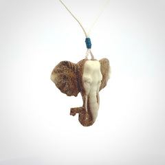 These are hand made elephant pendants, carved in a Deer Antler. The cord is length adjustable. Provided in a woven kete pouch and delivered with express courier.