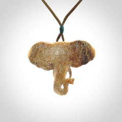 These are hand made elephant pendants, carved in a Deer Antler. The cord is length adjustable. Provided in a woven kete pouch and delivered with express courier.