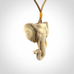 These are hand made elephant pendants, carved in a Deer Antler. The cord is length adjustable. Provided in a woven kete pouch and delivered with express courier.
