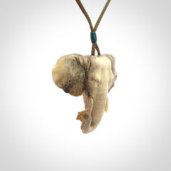 These are hand made elephant pendants, carved in a Deer Antler. The cord is length adjustable. Provided in a woven kete pouch and delivered with express courier.