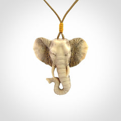 These are hand made elephant pendants, carved in a Deer Antler. The cord is length adjustable. Provided in a woven kete pouch and delivered with express courier.