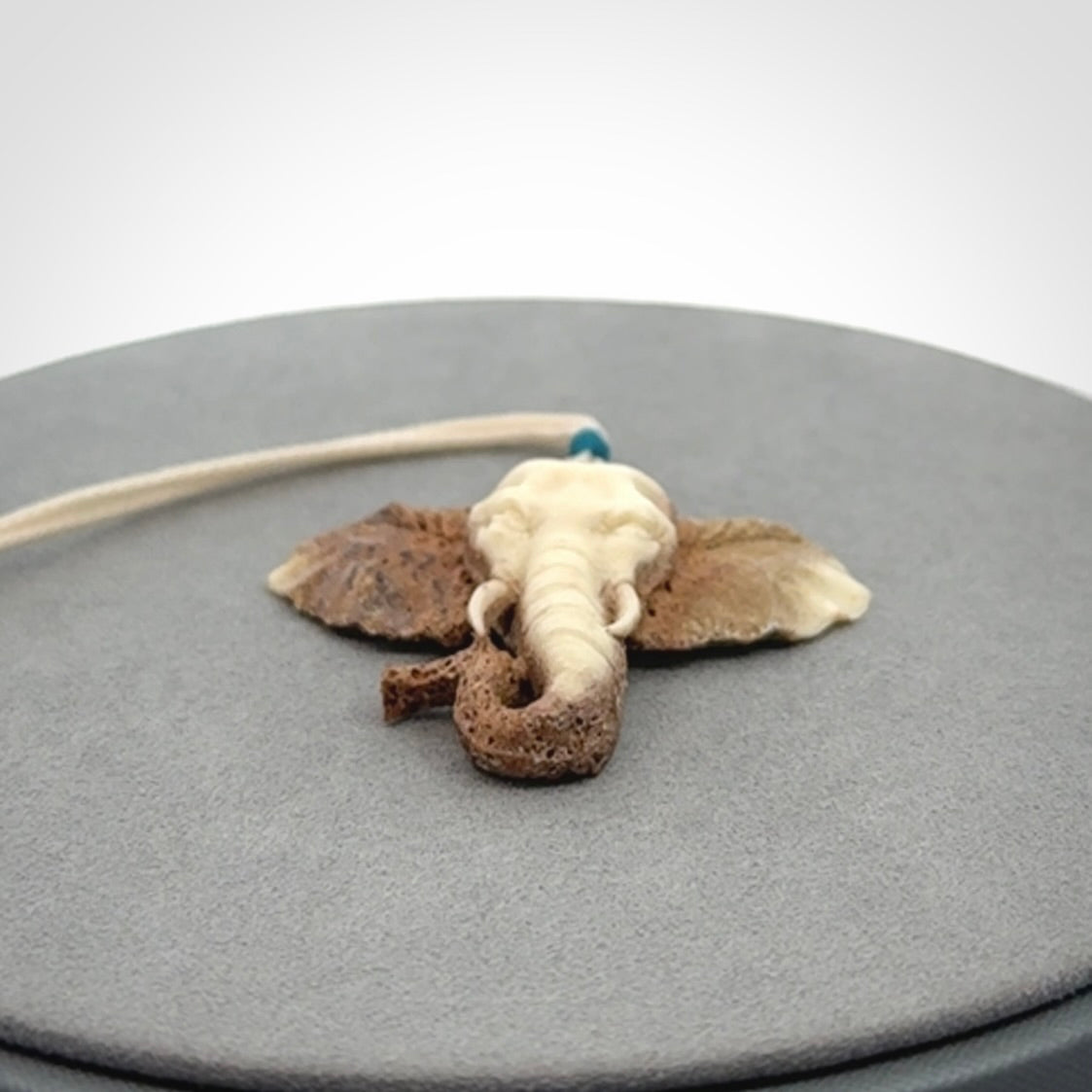 These are hand made elephant pendants, carved in a Deer Antler. The cord is length adjustable. Provided in a woven kete pouch and delivered with express courier.